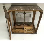 A wooden cased set of laboratory scales.Approx 47x