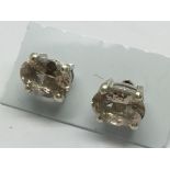A pair of morganite studs in silver