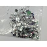 A bag of mixed loose stones including cubic zircon
