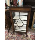 A small Edwardian inlaid and painted display cabinet.