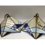 A pair of Tiffany style lamp shades.