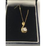 An 18 ct diamond solitaire pendant on chain