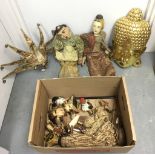 A gold painted wooden Buddha head, Venetian mask and box of Indian puppets