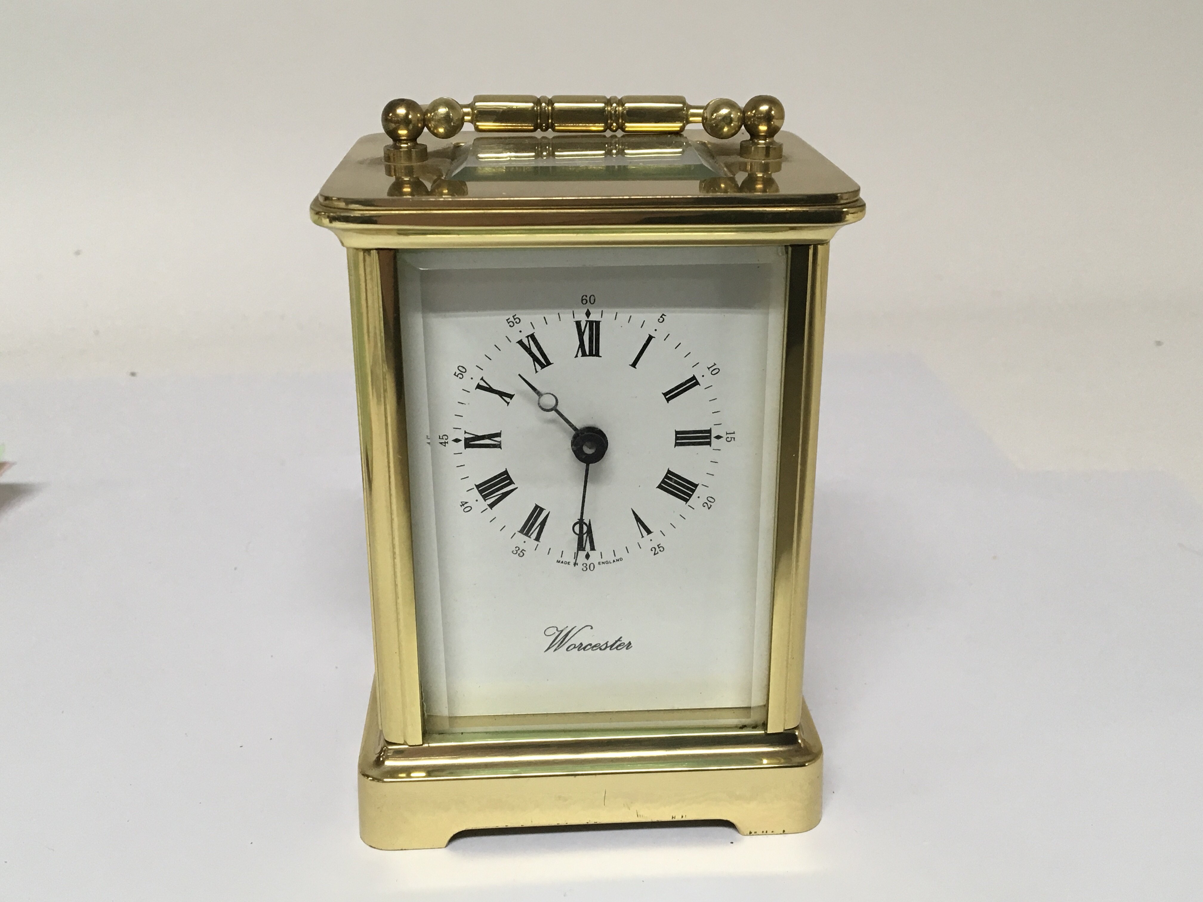 A brass cased French carriage clock.