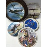 A collection of plates including two Royal Doulton and a V. E Day Purbeck Pottery