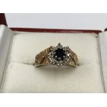 A 9ct sapphire and diamond set ring.