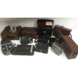 Two old plate cameras, a/f, plus cine cameras