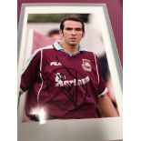 A collection of West Ham Paolo Di Canio memorabilia including posters book , photos and shirt.