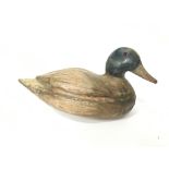 A wooden decoy style Duck