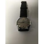 A timex quartz wrist watch with date aperture.