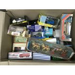 A box of boxed die cast vehicles including constru