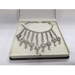 A costume necklace set with clear stones - NO RESE