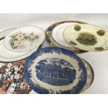 A collection of oval meat plates including blue and white and one decorated with Pheasants. (a lot)