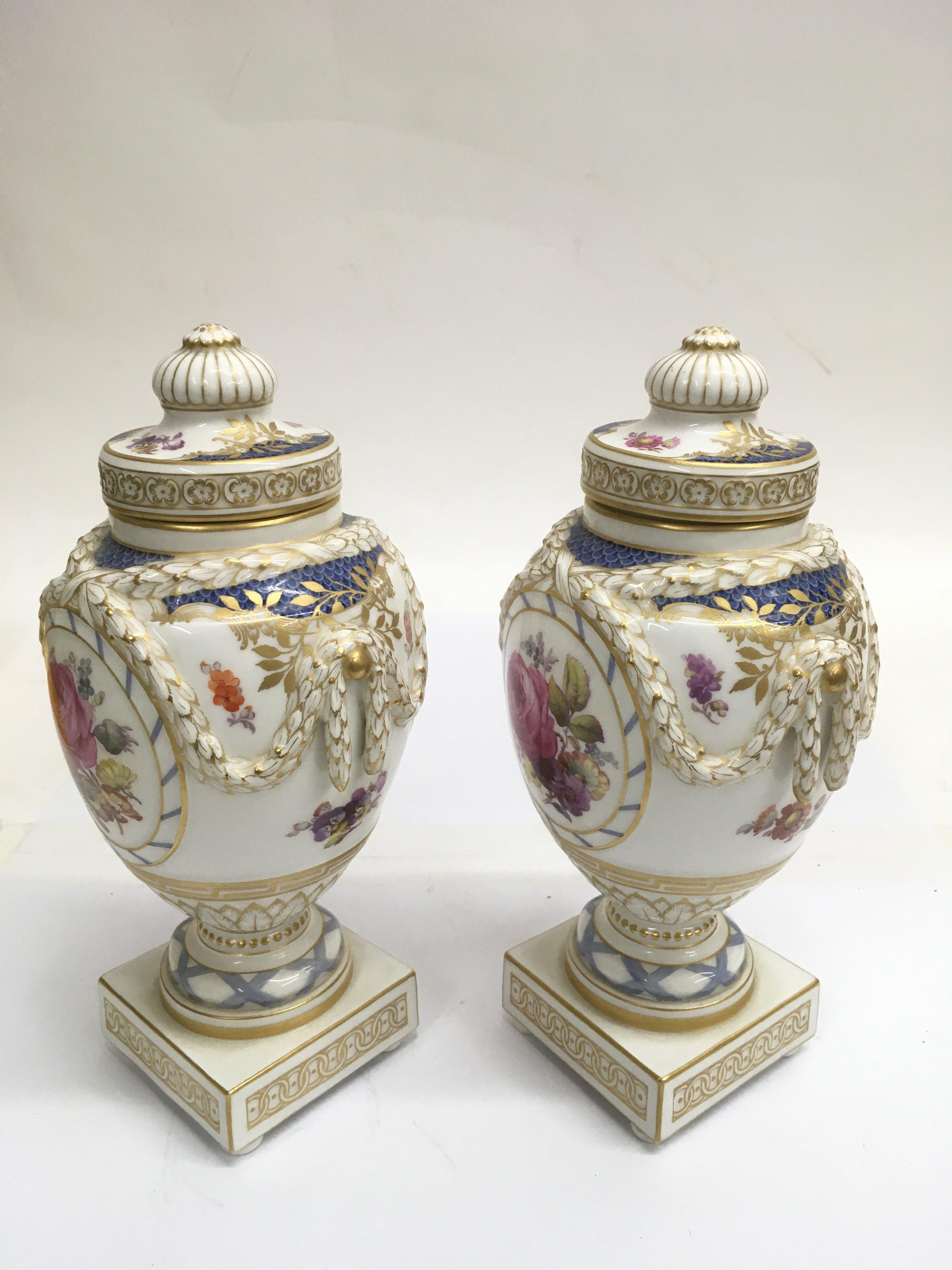 A fine pair of KPM porcelain lidded urns, of Class - Image 2 of 2