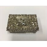 A small hallmarked silver ornate pill box.