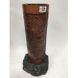 A large late 20thC carved bamboo vase. H.48cm.