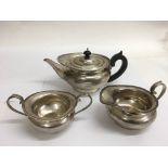 A silver three piece teaset with gadrooned edge, L