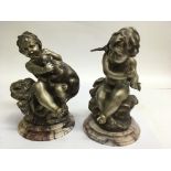 A pair of composite allegorical cherub figures on