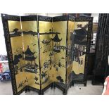 A Chinese 6 panel lacquered screen.