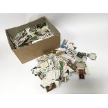 A box containing various cigarette cards