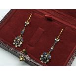 A pair of sapphire and diamond flower-style drop e