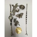 A collection of mixed vintage silver and white met