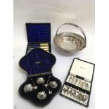 A cased Birmingham silver salt set, a set of Boy S