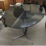 A vintage chrome and smoked glass top table.Approx
