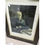 A oak framed print depicting Winston Churchill.