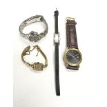 Four various watches including Omega and Gucci exa