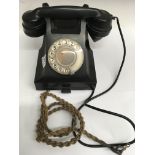 A black Bakelite telephone - NO RESERVE