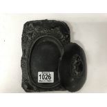 A 20thC carved stone ink grinding block and cover