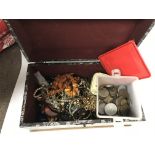 A box of mixed costume jewellery and coins.