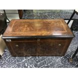 A walnut veneered and cross banded Victorian music box