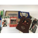 A collection of ephemera comprising football progr