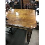 A large Victorian extending Wind out dining table