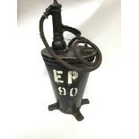 A vintage garage forecourt oil pump