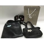 A small black Radley bag plus two other Radley ite