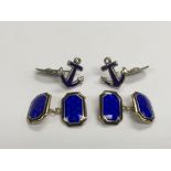 Two pairs of silver and enamel cufflinks, one pair