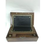 A burr walnut brass bound writing slope, slightly