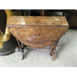 A small Victorian walnut Sutherland table
