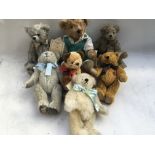 A collection of Deans Teddy bears, all tagged and