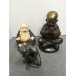 Three Buddha figures of various materials