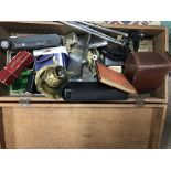 A wooden case of small interesting items