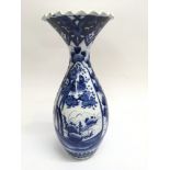 A Chinese blue and white vase with crimped rim.App