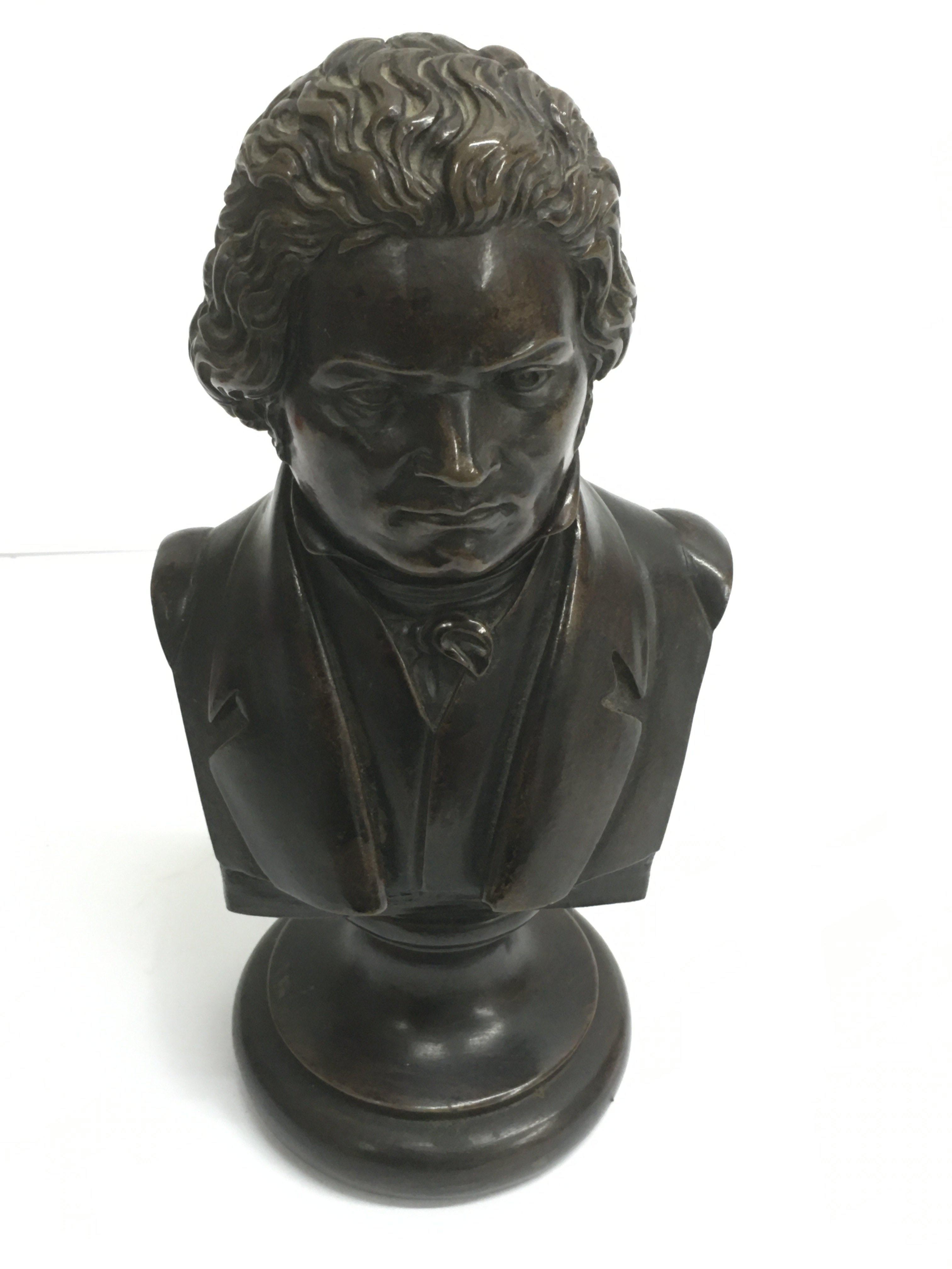 A bronzed bust of Beethoven, signed Rossetti.Appro