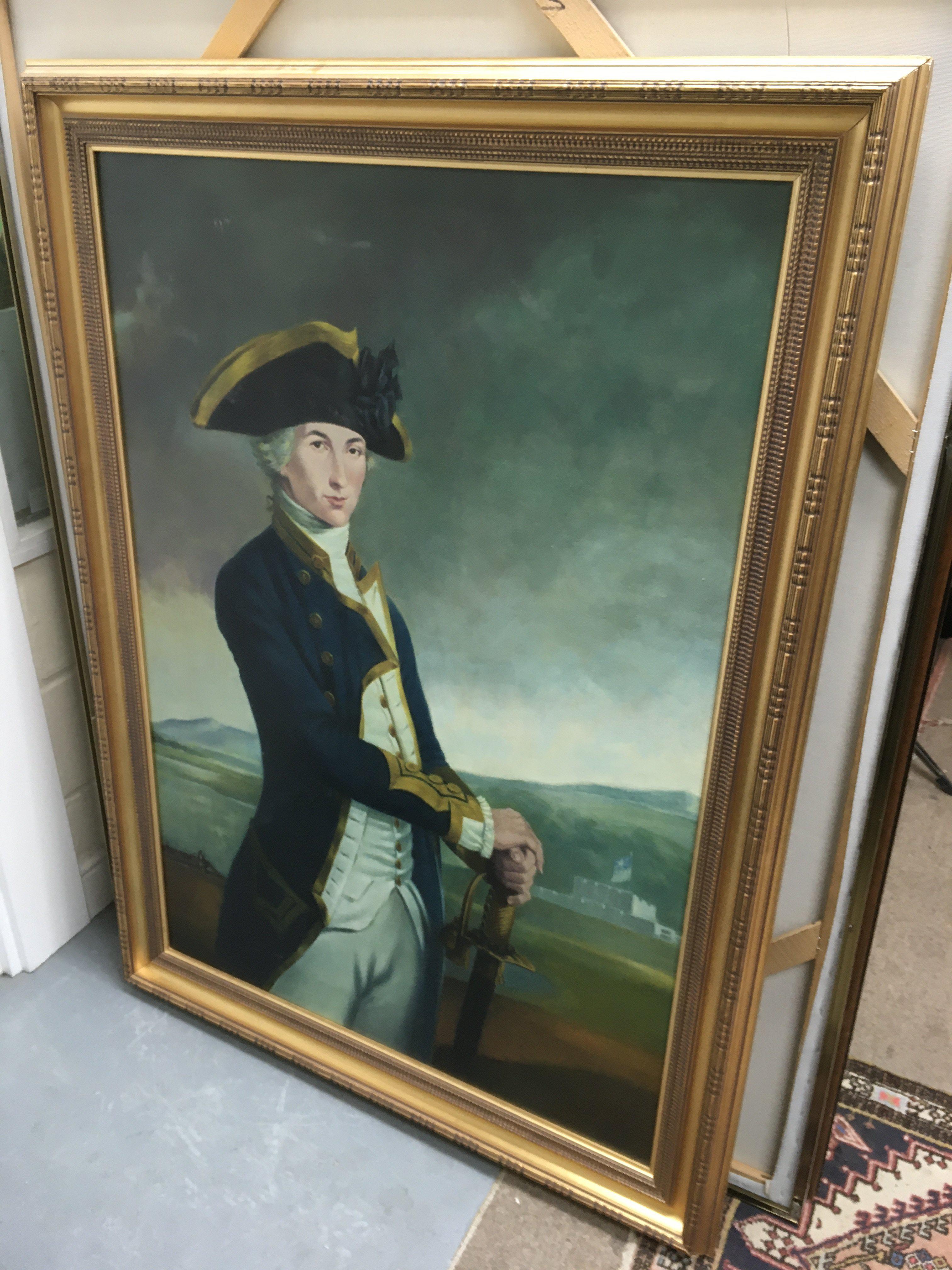 A large, gilt framed oil painting of a naval Capta