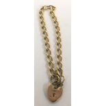 A 9ct gold chain link bracelet with heart shape cl