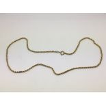 An unmarked gold chain, approx 9.3g.