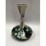 A Moorcroft pottery vase with artist monogram for